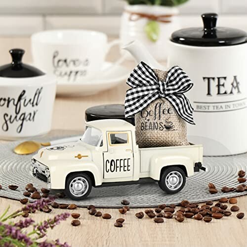 A beautifully styled coffee decor with a vase and coffee beans