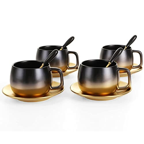 Set of four black and gold gradient coffee mugs with matching spoons and saucers