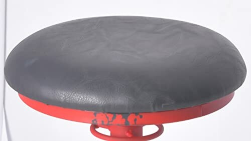 Black leather stool seat with red metal base.