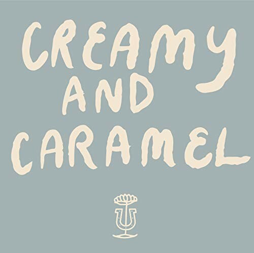 Creamy and Caramel text on a gray background.