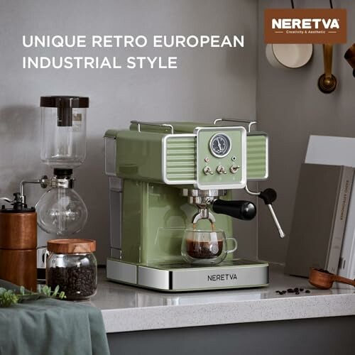 Green retro-style coffee maker on kitchen counter.