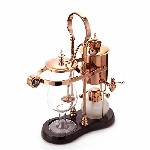 Elegant copper vacuum coffee maker with glass components.