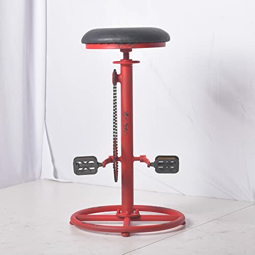 Red pedal stool with adjustable seat and foot pedals.