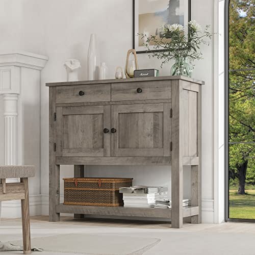 Rustic wood buffet cabinet with drawers and shelf in a living room.