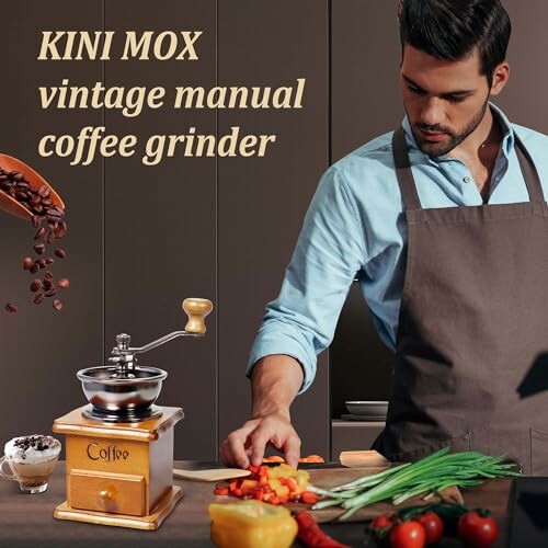 Man using vintage manual coffee grinder in kitchen